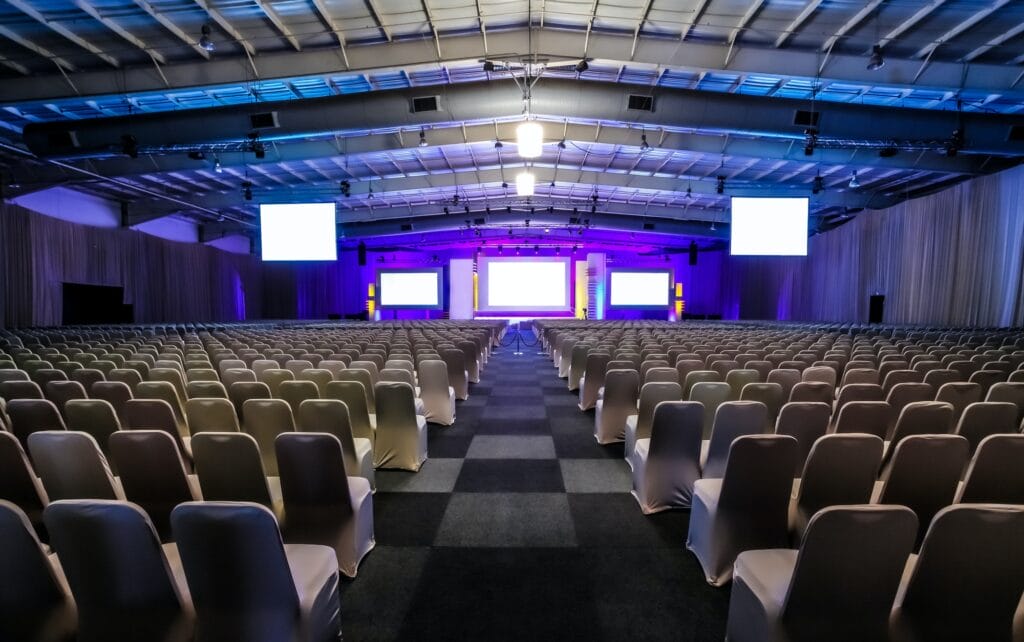 Rows of empty chairs in the large conference hall for corporate convention or lecture